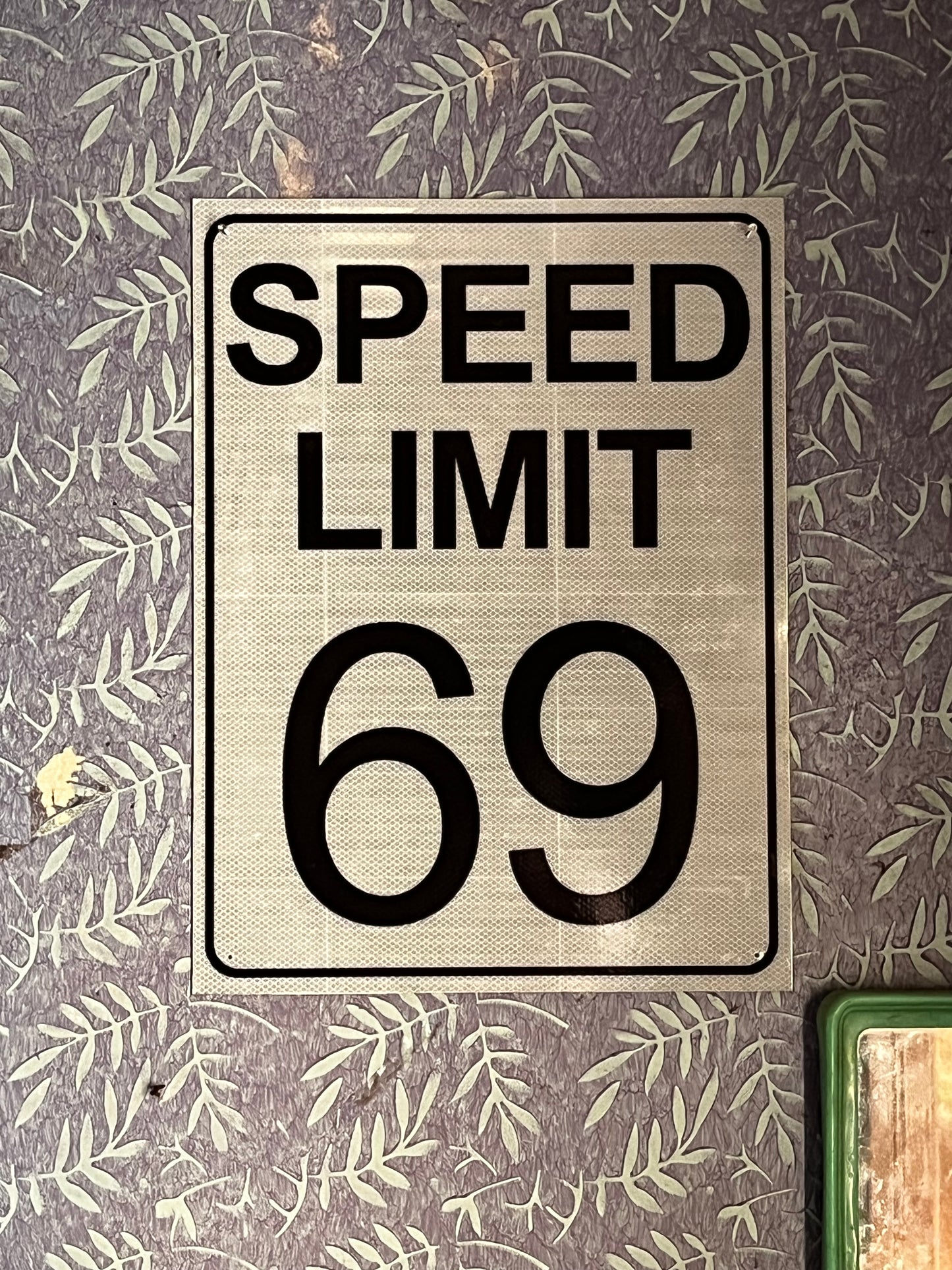 Speed limit 69 traffic sign